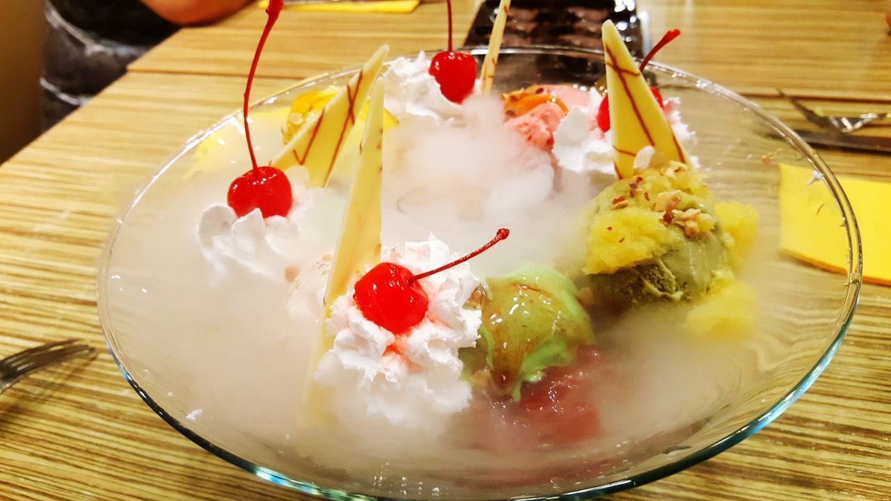 CLOSE-UP OF ICE CREAM WITH FRUITS IN PLATE