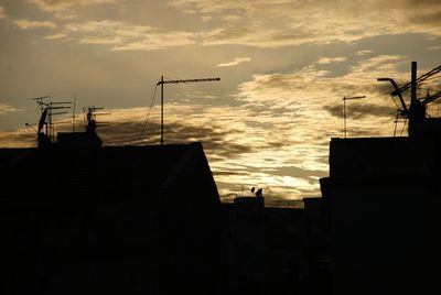 Silhouette of city at sunset