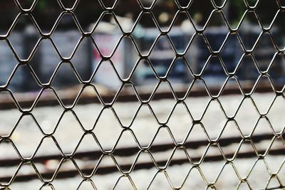 Chainlink fence seen through chainlink fence