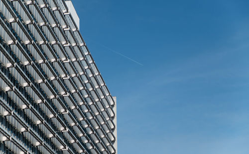 Low angle view of building against blue sky