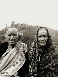Portrait of senior women against mountain