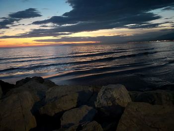 Scenic view of sea against sky during sunset