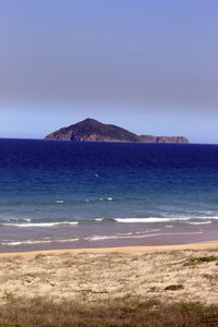 Scenic view of sea against clear sky