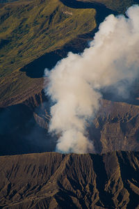 Aerial view of mountains against sky