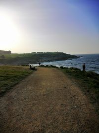 Scenic view of beach against clear sky