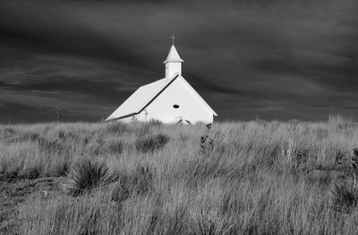 Sacred heart catholic church nestled in the grasslands of new mexico