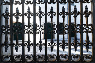 Iron gate protecting a baroque church in the historic center of salvador, pelourinho.