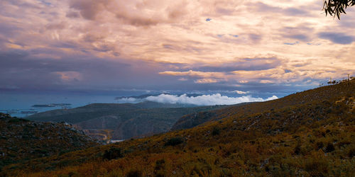 Scenic view of landscape against sky during sunset