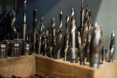 Close-up of work tools on table at workshop