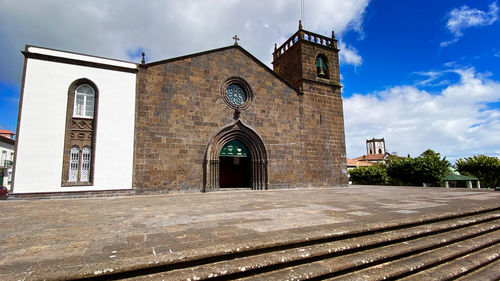 Facade of building against sky