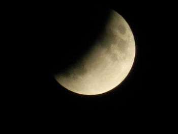 Low angle view of moon against sky at night