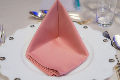 High angle view of wedding rings on table