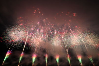 Firework display at night