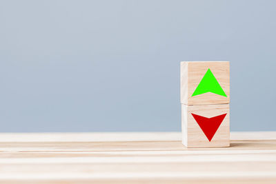 Close-up of toy flag on wooden table