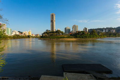 View of river with buildings in background