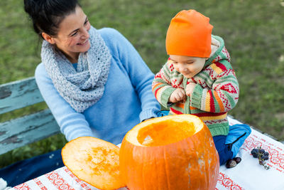 Cute girl with mother in garden