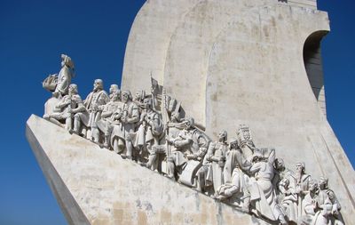 Low angle view of statue against sky