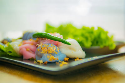 Close-up of served food in plate