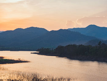 Scenic view of mountains against sky during sunset