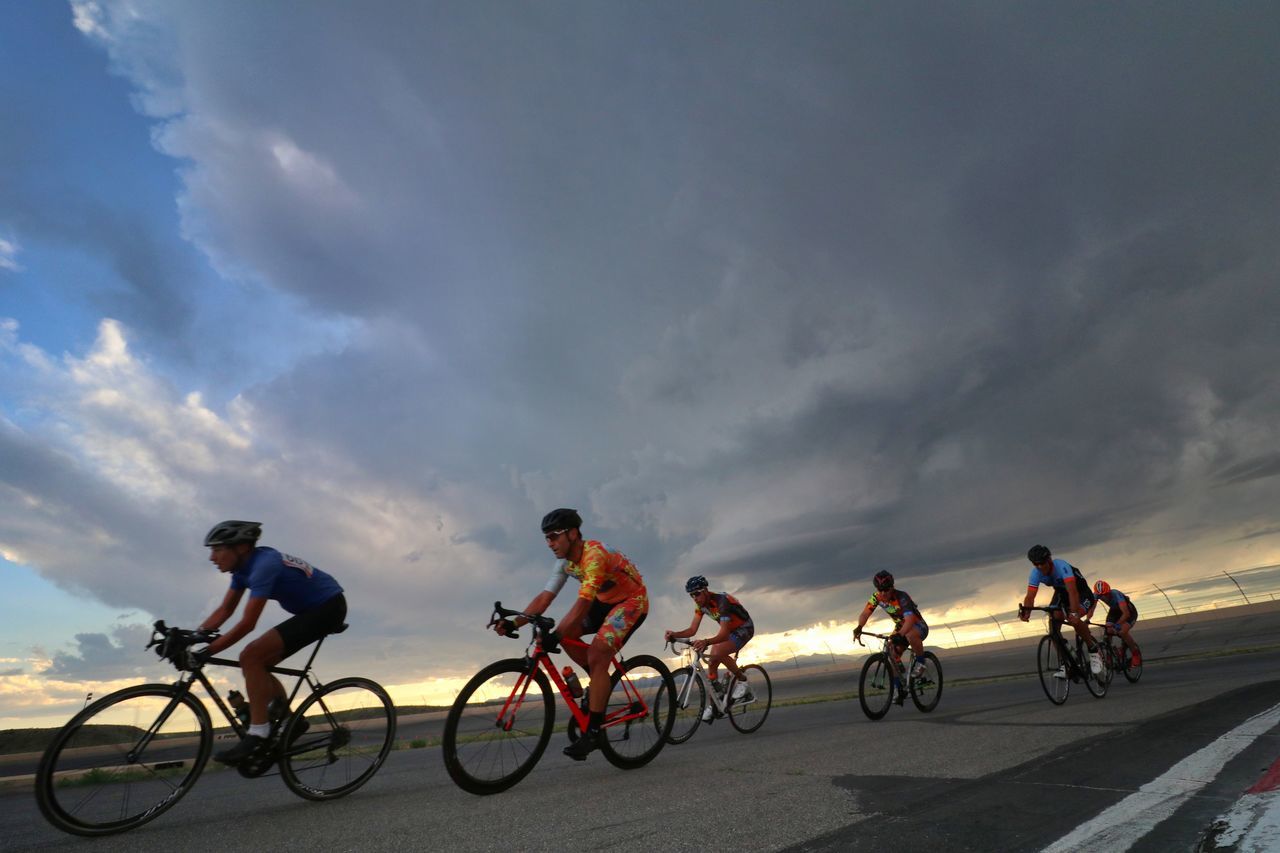 bicycle, sky, cloud - sky, men, riding, sports race, competition, cycling, real people, land vehicle, sport, transportation, leisure activity, motion, outdoors, speed, helmet, day, activity, nature, racing bicycle, adventure, competitive sport, sports clothing, headwear, sportsman, biker, athlete, people