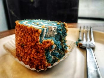 Close-up of cake served on table