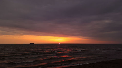 Scenic view of sunset over sea