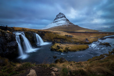 Kirkjufell and the kirjufellsfoss waterfalls in grundarfjordur, snaefelsness peninsula, iceland