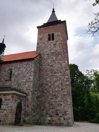 Low angle view of historic building against sky