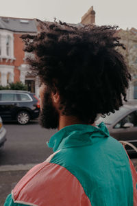 Rear view of man in car