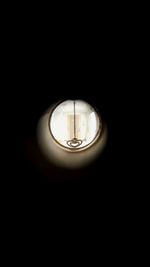 Low angle view of illuminated light bulb