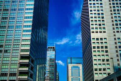 Low angle view of skyscrapers against sky