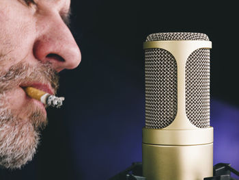 Close-up of man with microphone