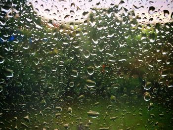 Close-up of water drops on glass