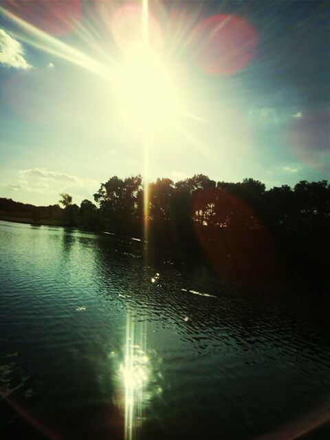 sun, water, sunbeam, sunlight, reflection, lens flare, tranquility, tranquil scene, sky, beauty in nature, lake, scenics, tree, nature, river, bright, waterfront, sunset, sunny, idyllic