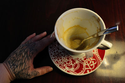 High angle view of coffee cup on table