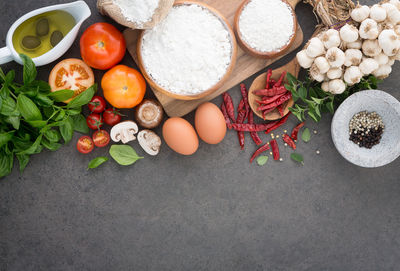 High angle view of fruits and vegetables on cutting board