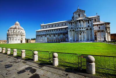 Exterior of historic buildings against clear blue sky