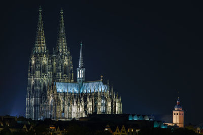 View of cologne cathedral against sky at night