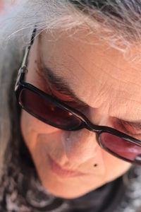 Close-up portrait of man wearing sunglasses