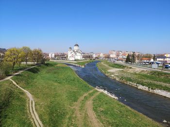 View of buildings against blue sky