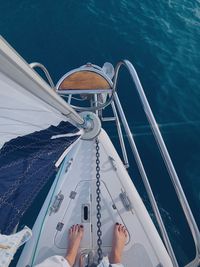 Low section of person sailing in sea