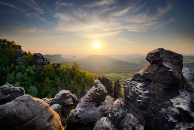 Scenic view of mountains against sky during sunset