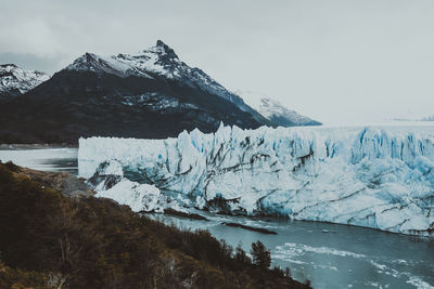 Scenic view of snowcapped mountain against sky