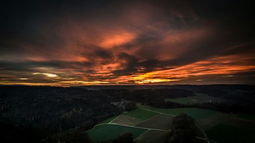 Scenic view of landscape against sky during sunset