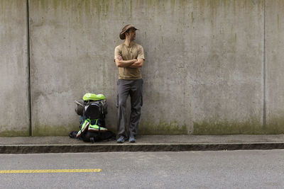 Full length of man working on street