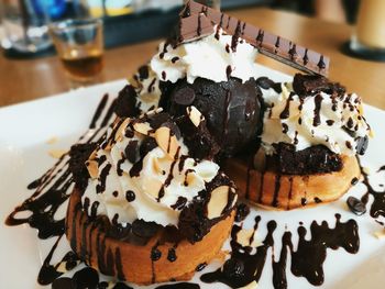 Close-up of cake served on table