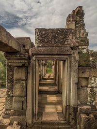 Old ruins of building against sky