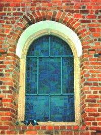 Closed door of brick wall