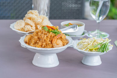 Close-up of food served on table