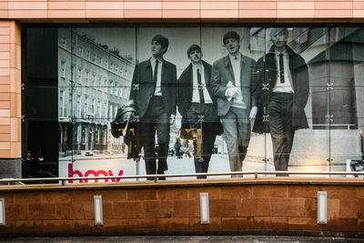 People in front of building